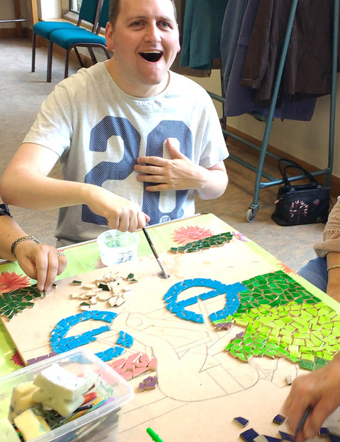 Artizan International Activity with young man. Partner with the IF Trust